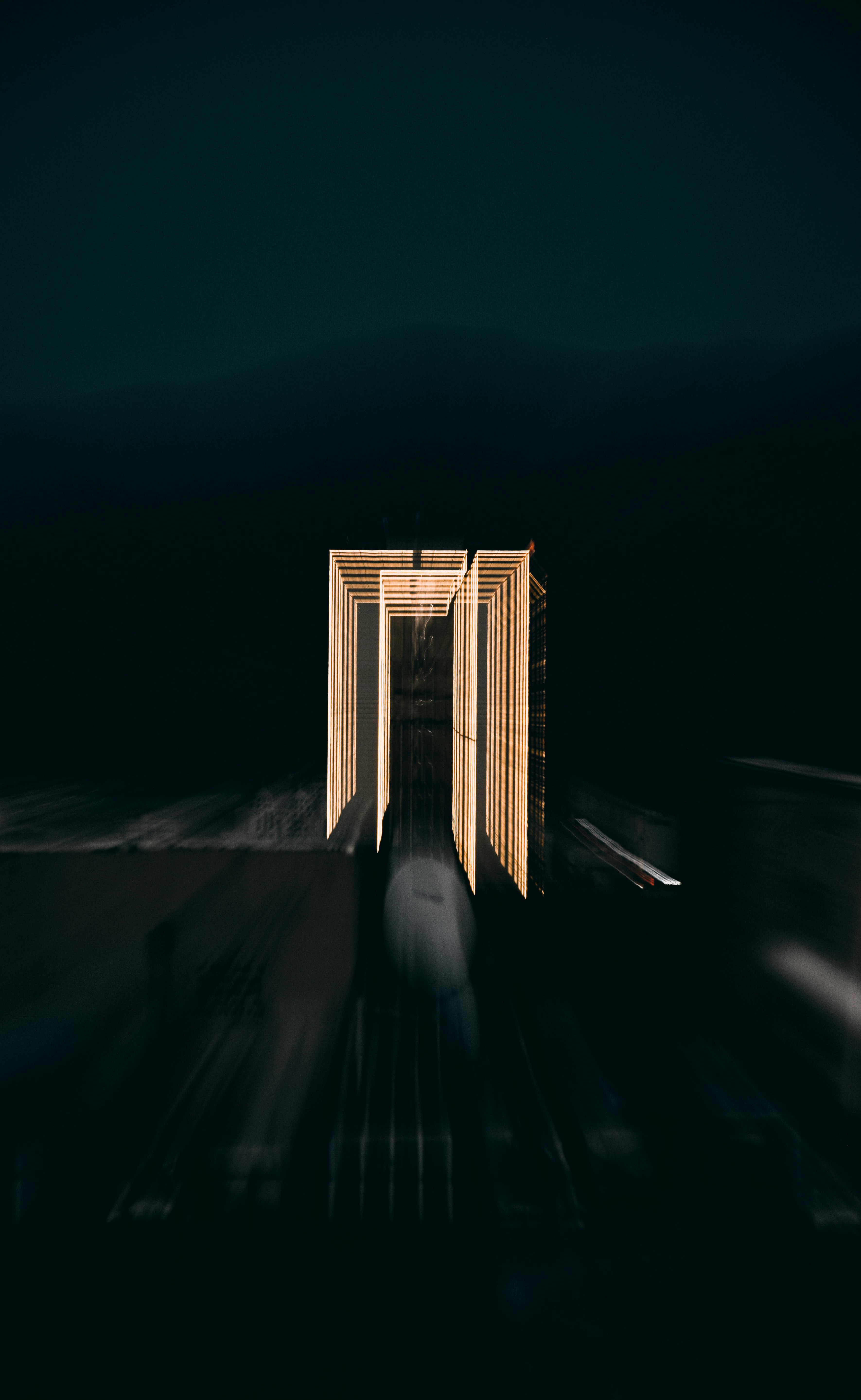 brown and white building during night time